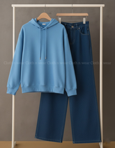 Plain sky blue hoodie with dark blue wide leg jeans